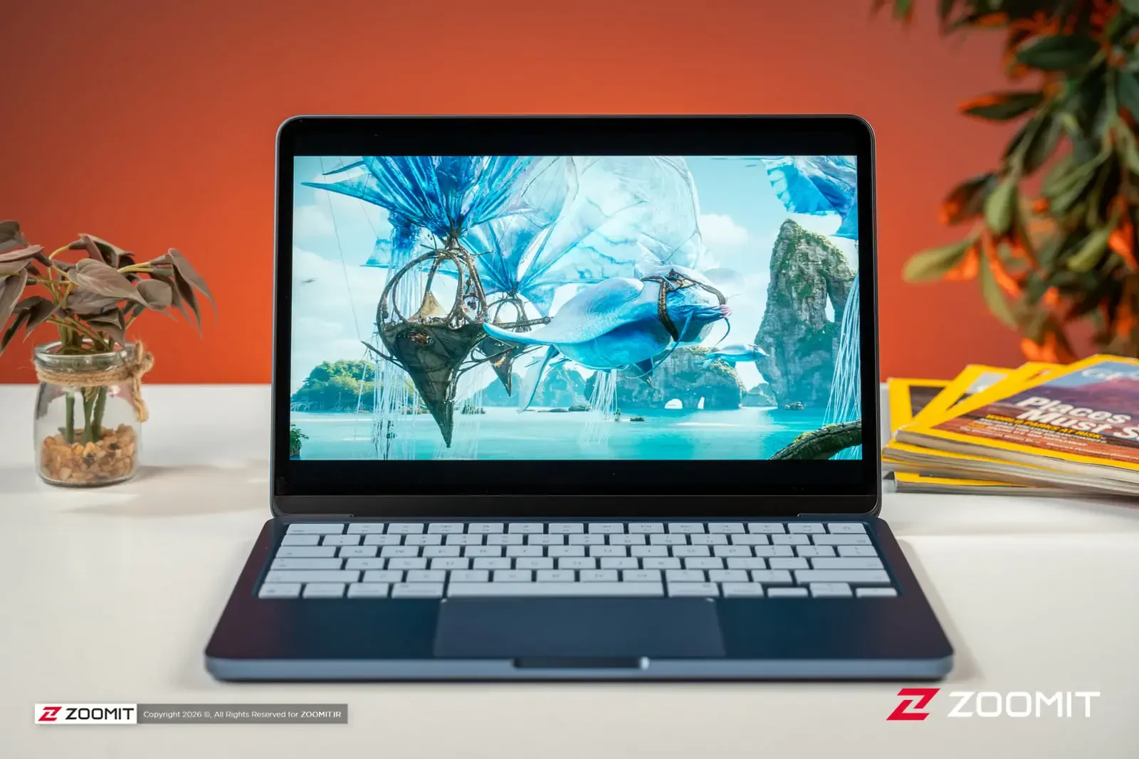 لپتاپ اپل مکبوک نئو (Apple MacBook Neo) با نمایش تصویر فانتزی روی صفحه