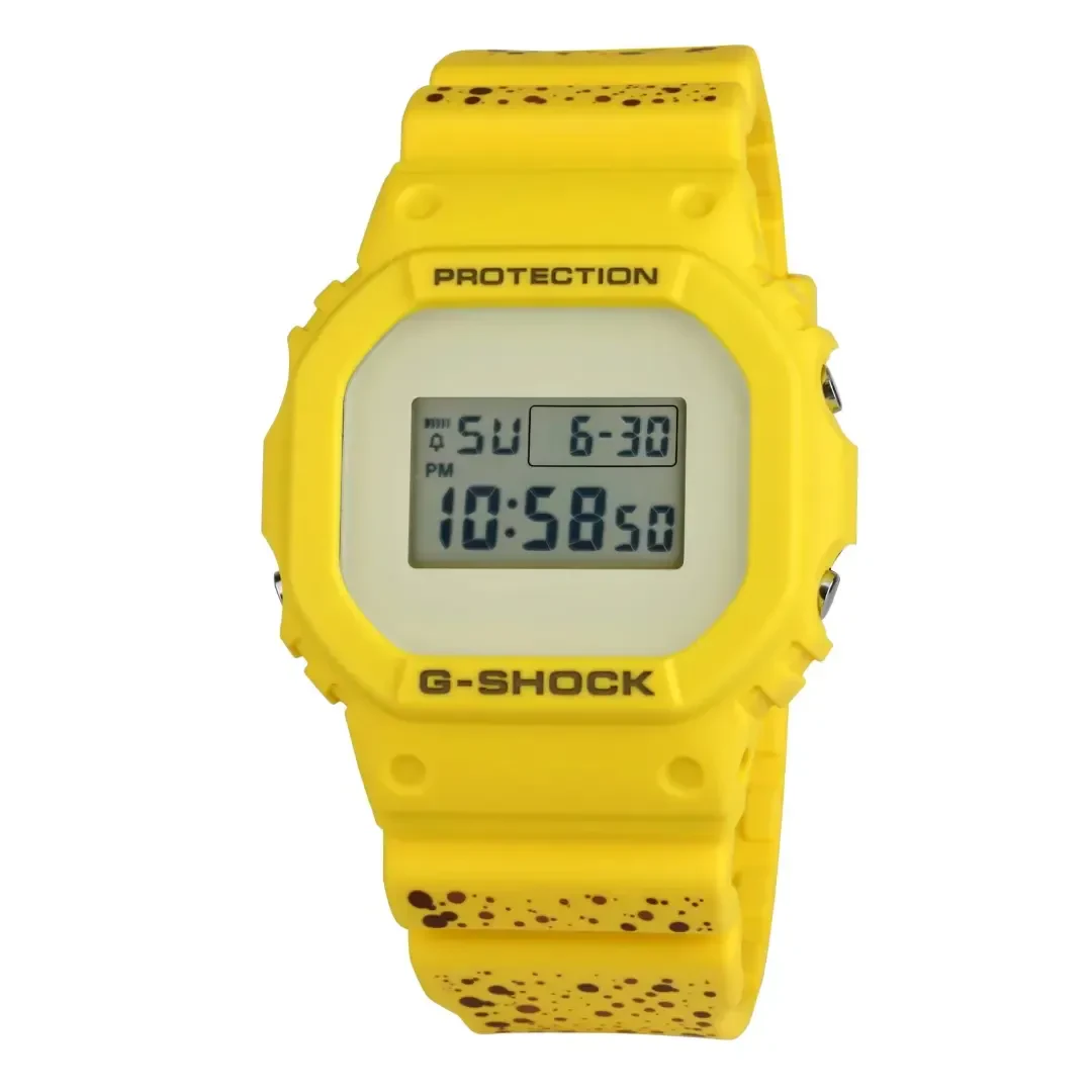 ساعت دیجیتال جیشاک (G-Shock) با بند زرد و طرح خالهای قهوهای