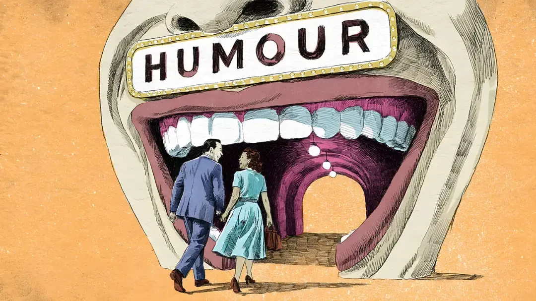 یک زوج در حال قدم زدن به سمت دهانی بزرگ با تابلوی HUMOUR